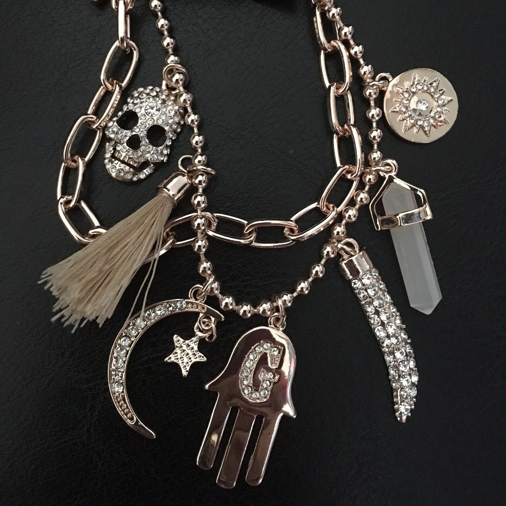 Guess Hamsa Moon Star Horn Crystal Skull Medallion